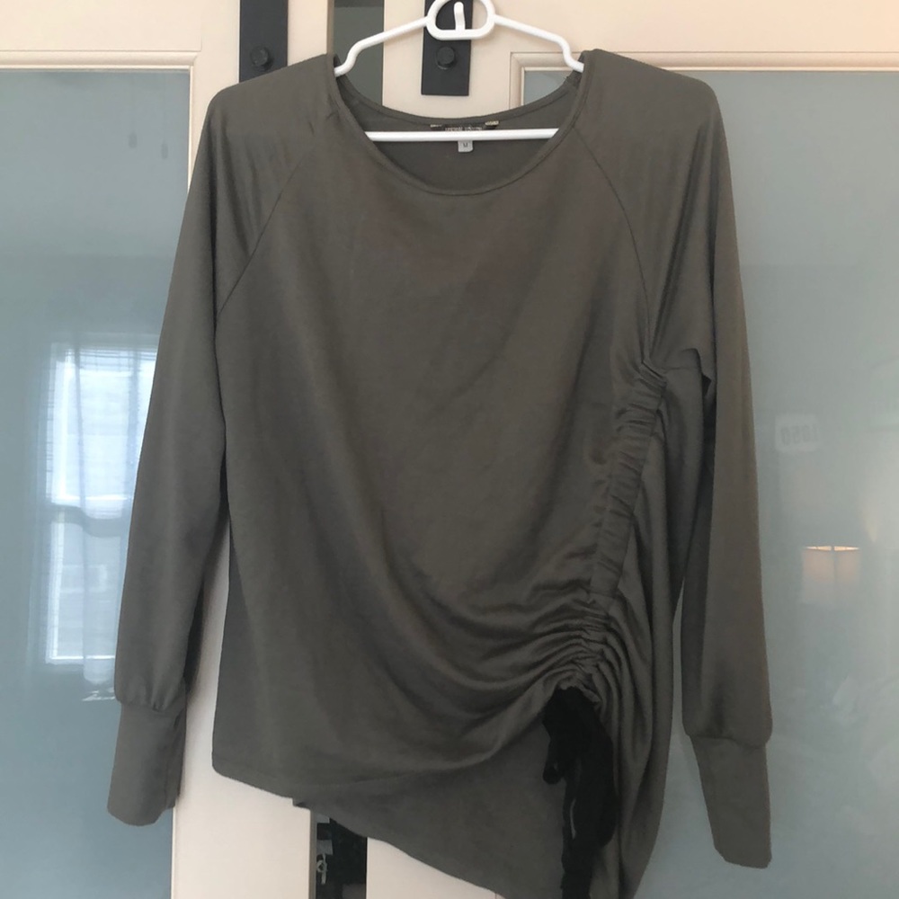 Green jersey knit top. Size S